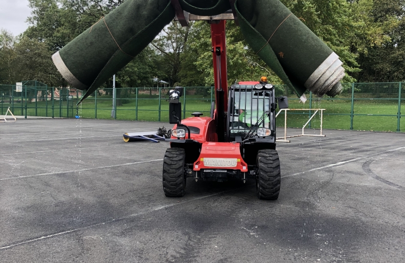 The old pitch being taken away!