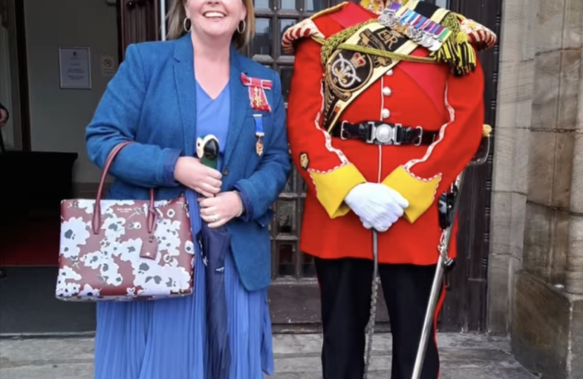 Abi Brown with Staffordshire Regiment Mascot Watchman and handler Greg Hedges