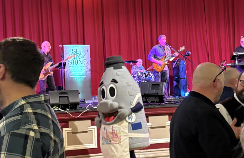 Stoke-on-Trent's centenary mascot Kelvin the Kiln dancing