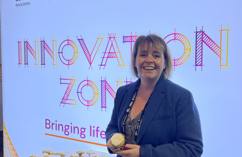 Abi Brown celebrating with cake - what else! - in the Innovation Zone