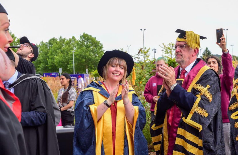 Celebrating with fellow graduates